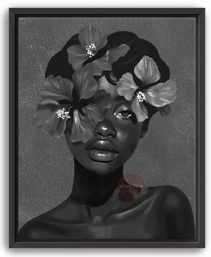 A black and white portrait of a woman with a flower crown on her head, set against a dark background.