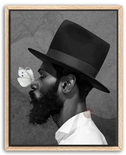 A black and white portrait of a man with a large hat, a long beard, and a butterfly resting on his nose.