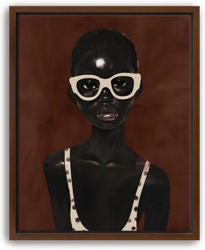 The image is a framed artwork depicting a woman wearing a polka dot swimsuit top and white sunglasses against a brown background.