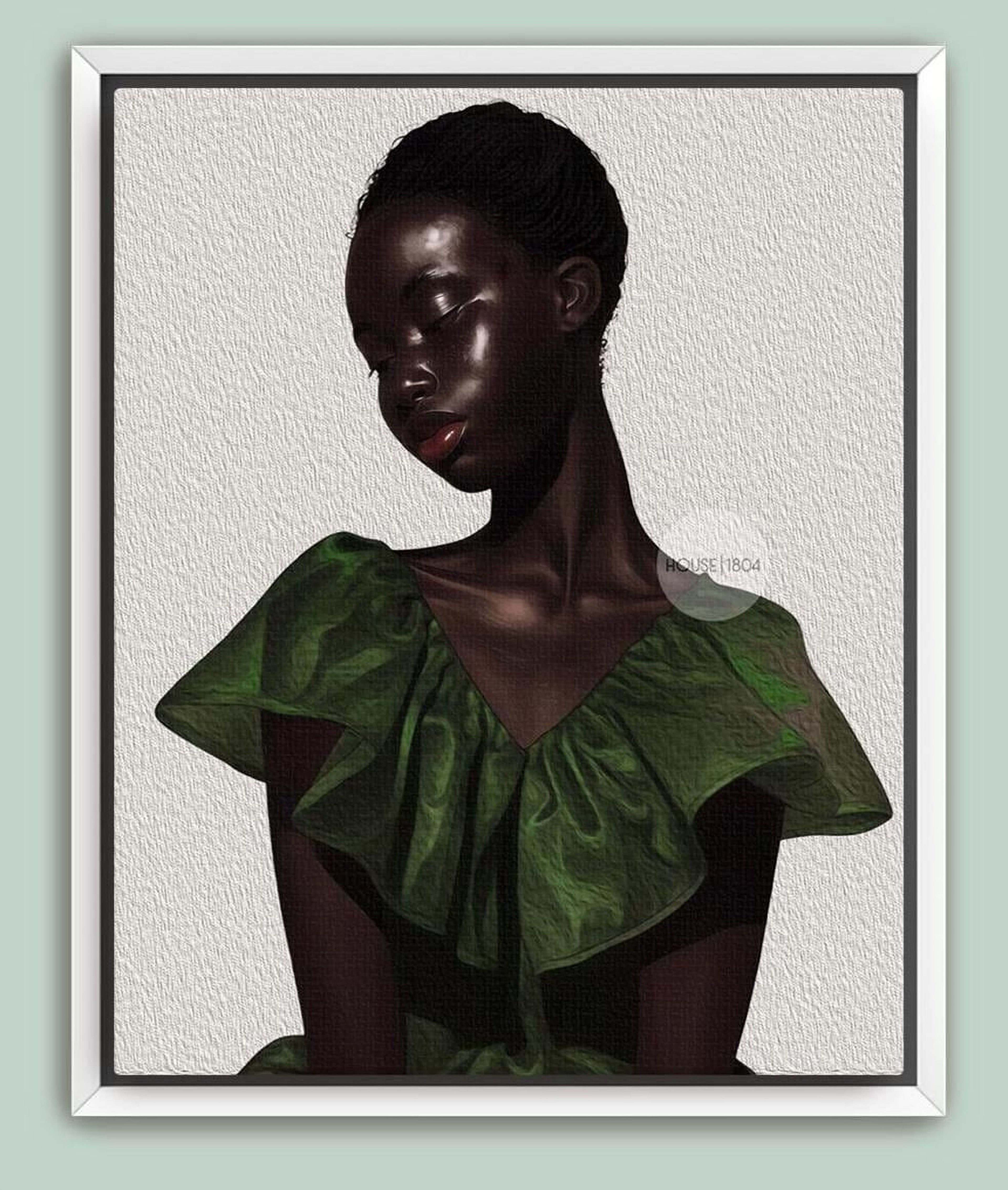 a woman with dark hair wearing a green dress.