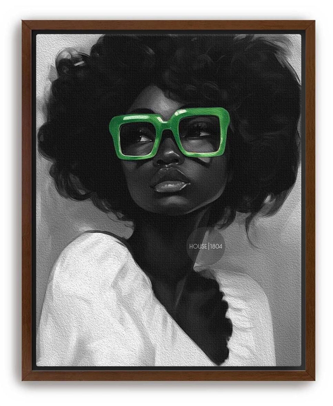 A black and white portrait of a Black woman with curly afro hair wearing large bold green reading glasses. Brown framed canvas print.