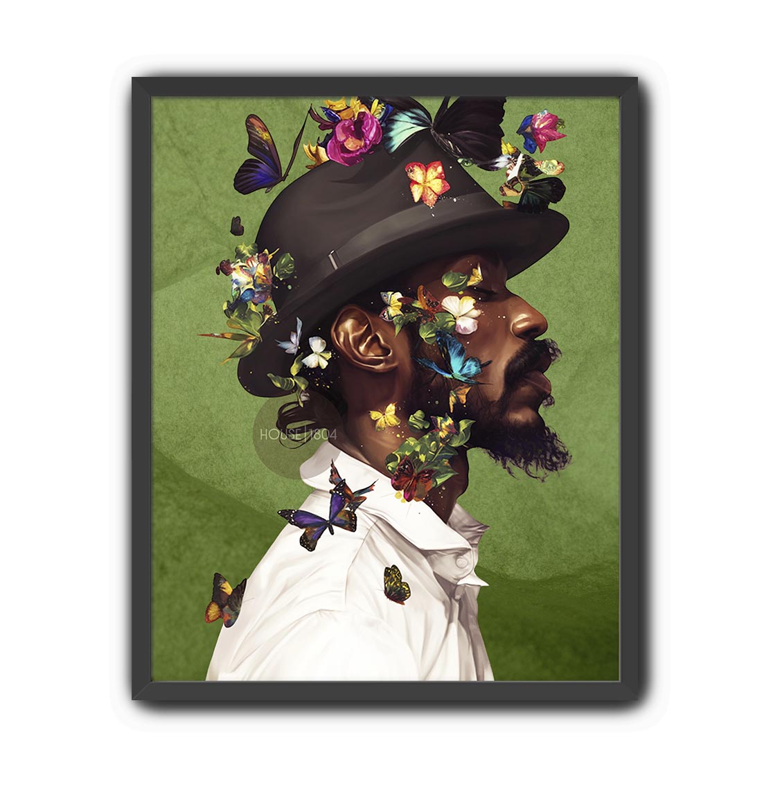 A man wearing a hat adorned with colorful butterflies and flowers, with a white shirt and a beard.